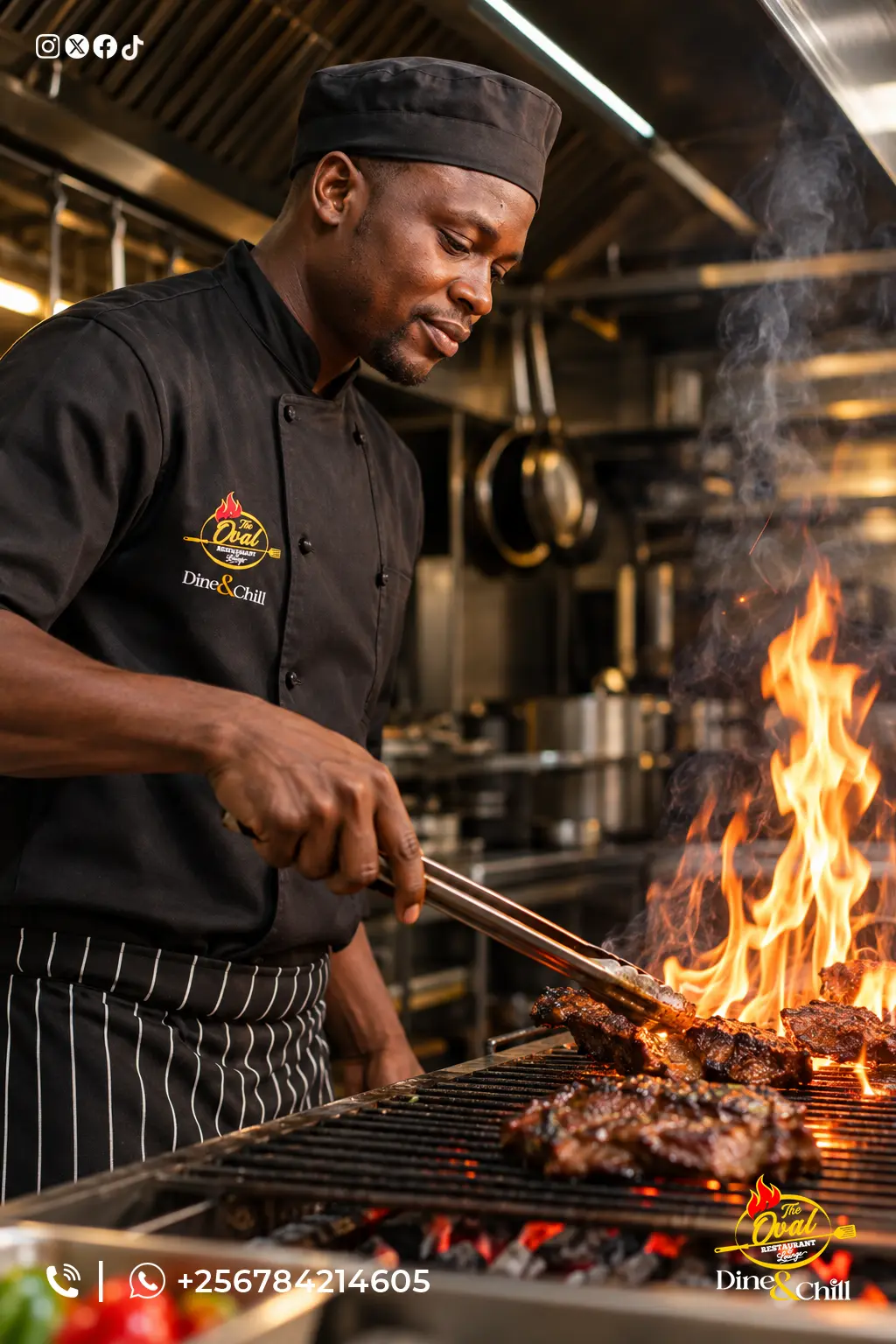 Oval chef turning meat over open flames on the grill
